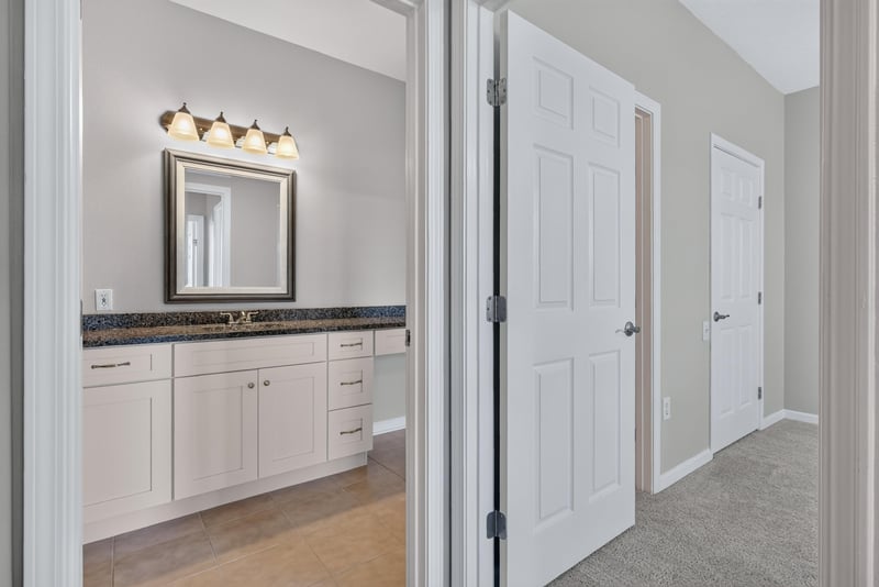 Bathroom vanity with mirror at 7990 Baymeadows Rd E #404, Jacksonville, FL 32256