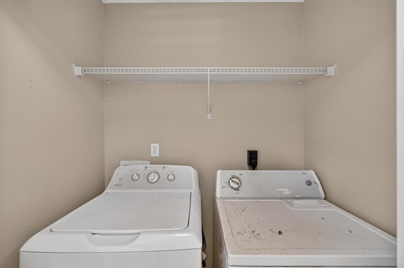 Laundry room with washer and dryer at 1572 Biscayne Bay Dr, Jacksonville, FL 32218