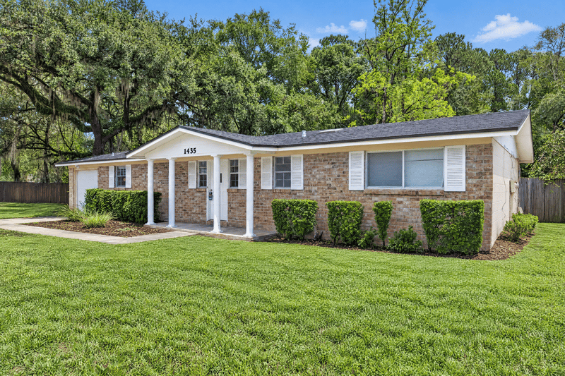 Angled front exterior view with entry walkway at 1435 Undine Ave, Jacksonville, FL