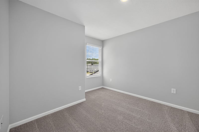 Bedroom with carpet and window, unfurnished at 2837 Black Buck Cir, Jacksonville, FL 32225