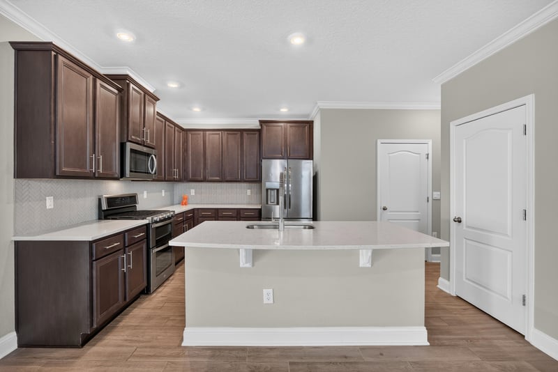 Kitchen view toward pantry door at 331 Millerstone Dr, St. Augustine, FL 32092