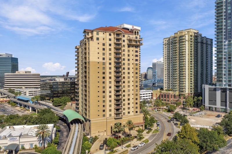 Day aerial of downtown Jacksonville skyline and St. Johns River in Jacksonville, FL
