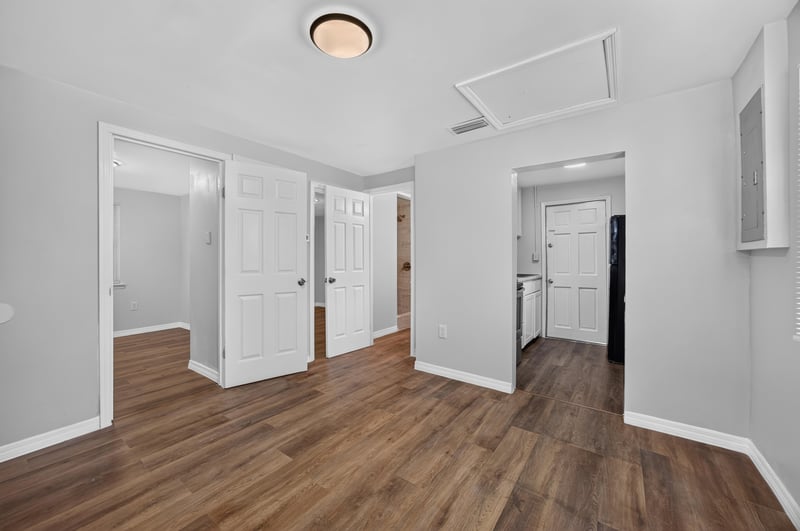 Hallway with closet doors leading to kitchen at 4951 Halls Dr