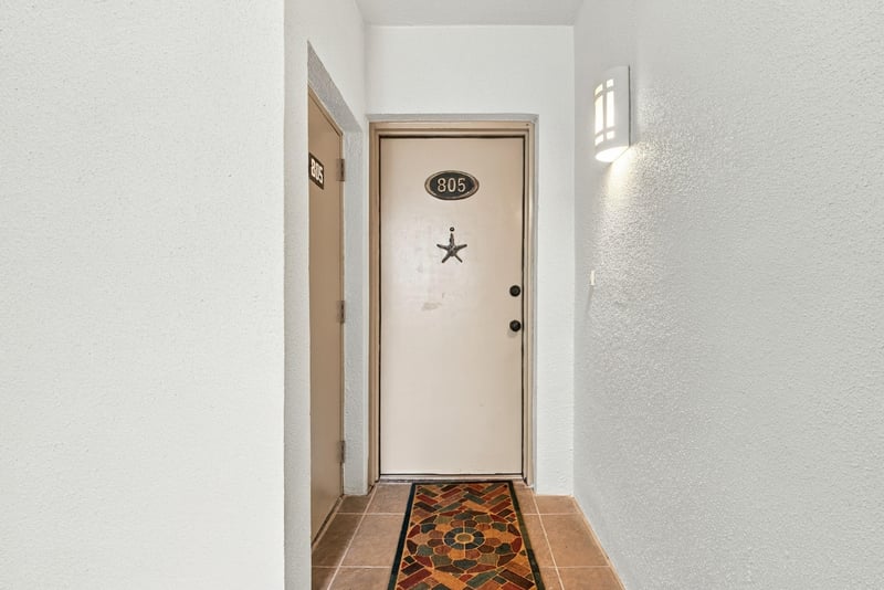 Front door with address plaque at 805 Spinnakers Reach Dr, Ponte Vedra Beach, FL 32082