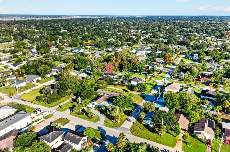 Aerial panoramic view of tree-lined streets in Jacksonville Beach, FL