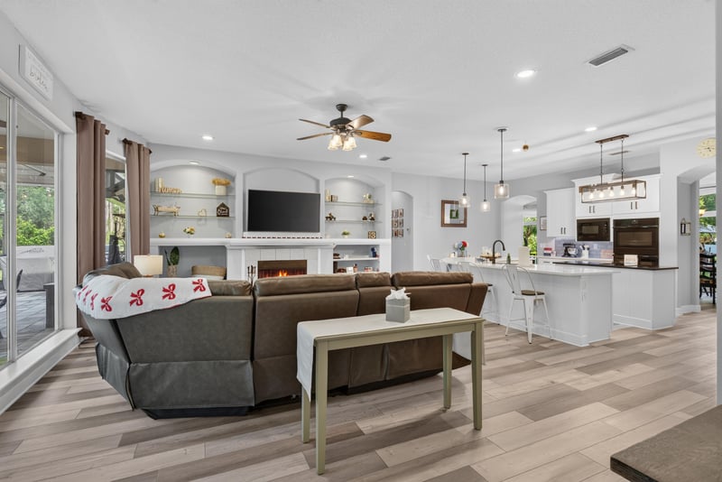 Living room open to the kitchen at 2304 Spring Hill Ct, Orange Park, FL