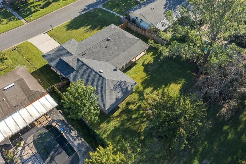 Drone aerial view of the home and roofline, photographed by Megapixeler on Crosby Ln, Orange Park