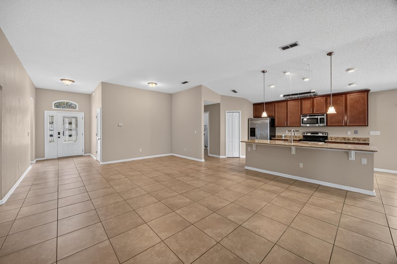 Living and dining area with tile floor at 469 Glendale Ln, Orange Park, FL