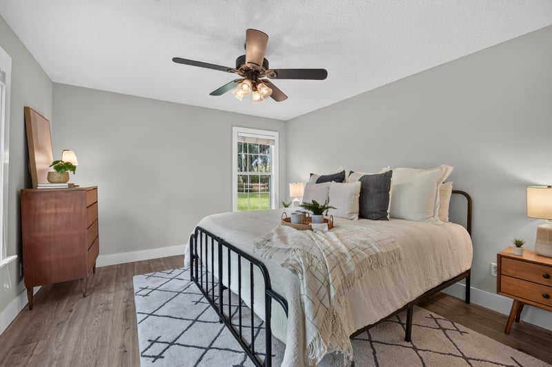 Bedroom with bed and nightstand at 1161 Whispering Pines Rd, Jacksonville, FL 32259