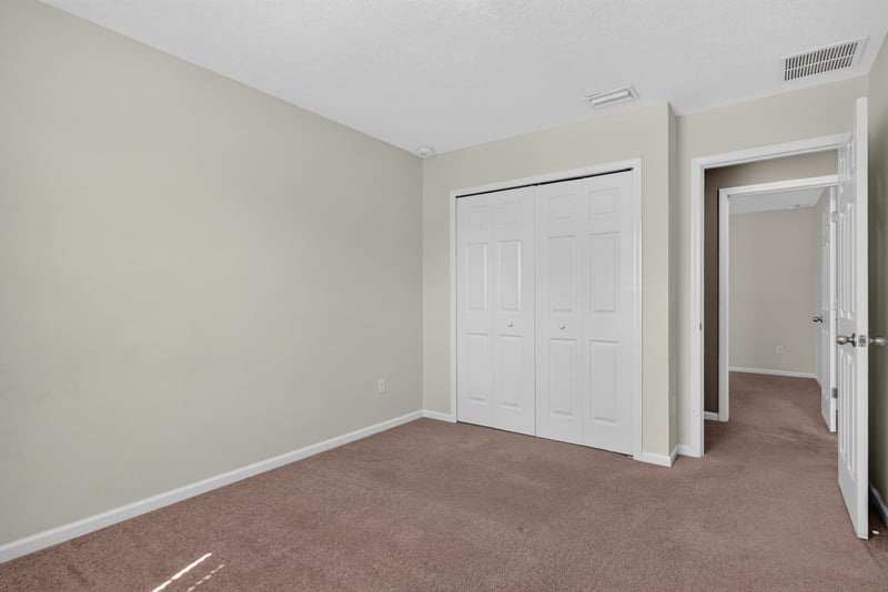 Bedroom with carpet and closet at 263 Gilmore Ln, Orange Park, FL 32065
