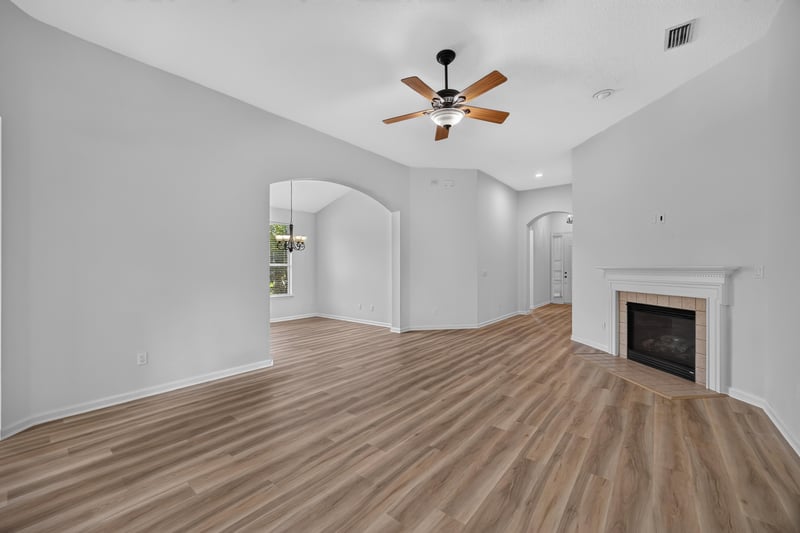 Living room fireplace seen from kitchen entry at 3101 E Banister Rd, St. Augustine, FL 32092