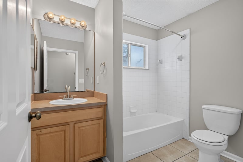 Bathroom with tub and shower combo at 12949 Chets Creek Dr S, Jacksonville, FL 32224