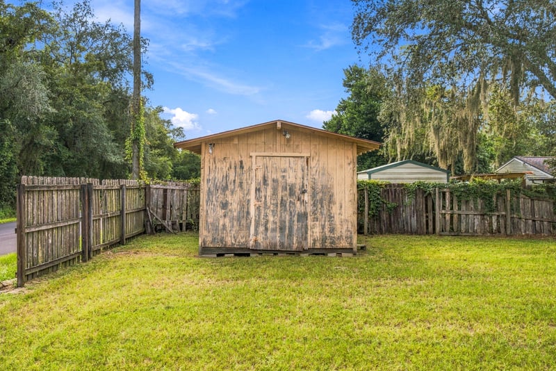 Wood storage shed in the backyard at 2915 Trenton Ct, Orange Park, FL