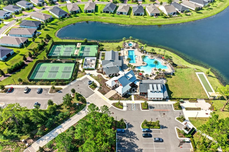 Aerial view of tennis courts, pool and clubhouse in St. Augustine, FL
