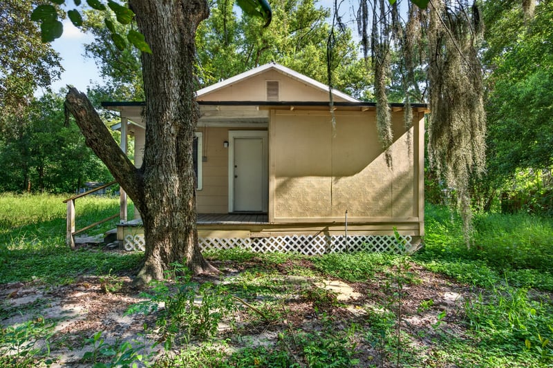 Rear exterior with covered porch at 2372 2nd Ave, Jacksonville, FL 32208