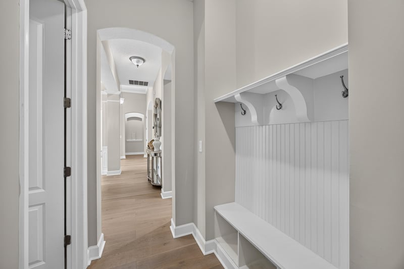 Mudroom with wall hooks and bench at 276 Cross Ridge Dr, Ponte Vedra Beach, FL 32081