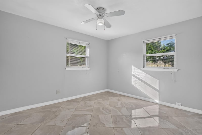 Bedroom with tile flooring and window at 442 Ameca Ave, Orange Park, FL 32073