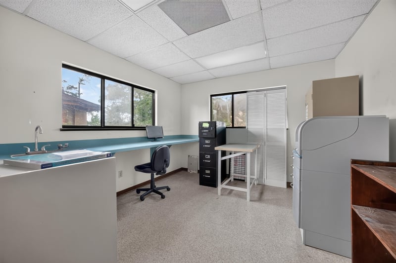 Room with sink counter, cabinets and window view at 1543 Kingsley Ave #19, Orange Park, FL 32073