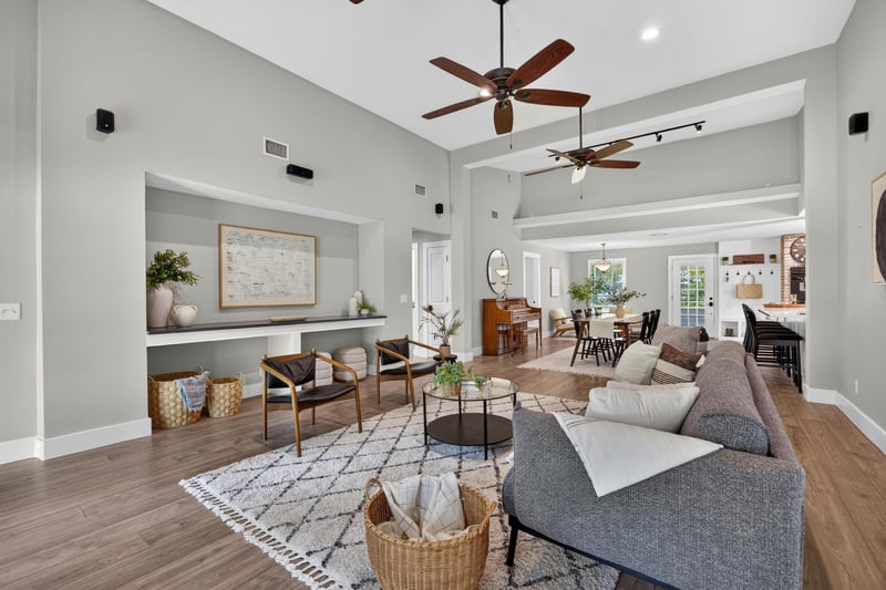Living room with sitting area and desk nook at 1161 Whispering Pines Rd, Jacksonville, FL 32259