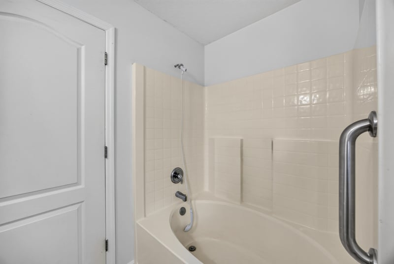 Bathroom with step-in shower at 9691 Nelson Forks Dr, Jacksonville, FL 32222