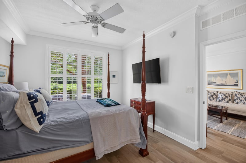 Bedroom with wall-mounted TV at 10435 Mid Town Pkwy unit 135, Jacksonville, FL 32246