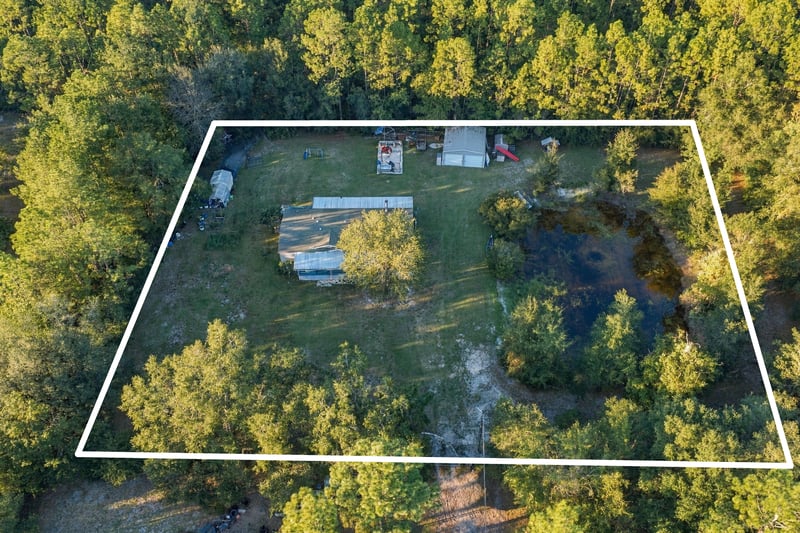 Aerial view with property outline, photographed by Megapixeler on Secret Cove Rd, Middleburg, FL