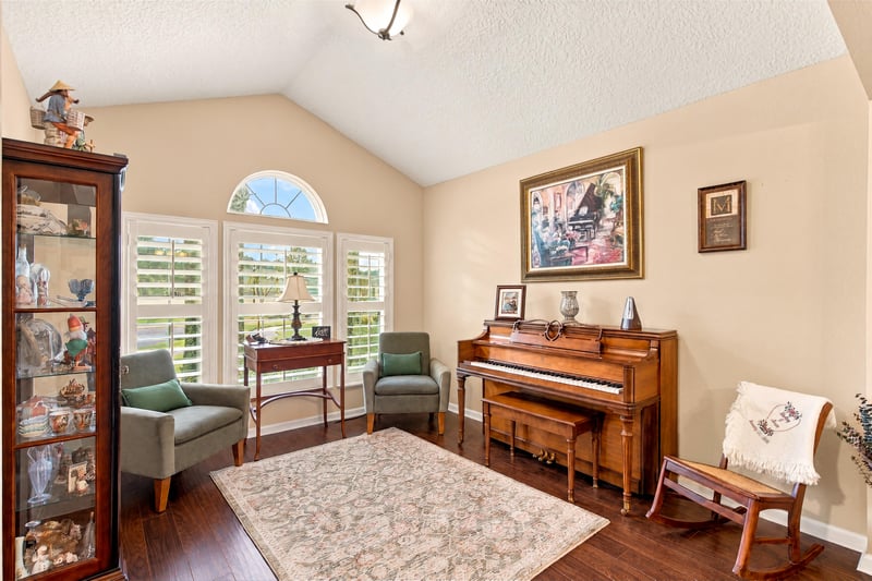 Flex room with piano and vaulted ceiling at 10923 Black Diamond Ct, Jacksonville, FL