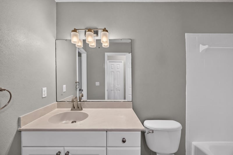 Bathroom vanity and mirror at 1800 Park Ave apt 358, Orange Park, FL
