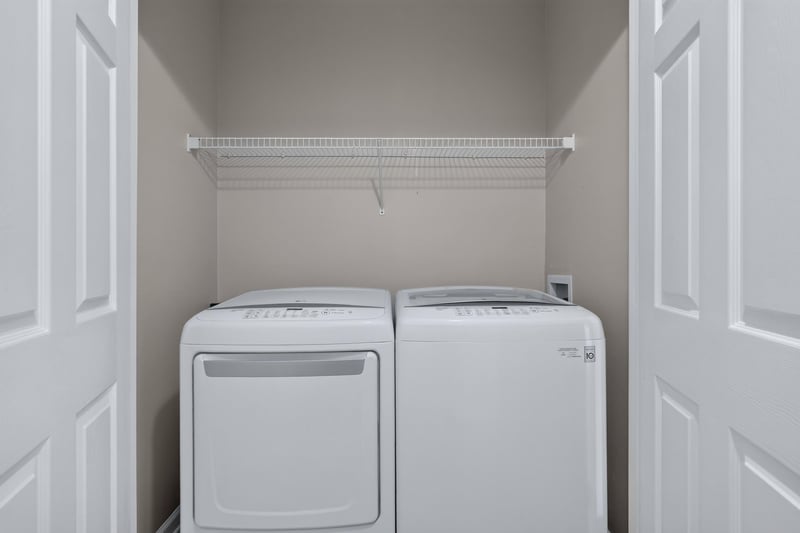 Laundry closet with washer and dryer at 7990 Baymeadows Rd E #404, Jacksonville, FL 32256