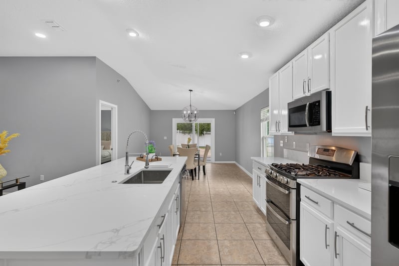 Kitchen with long island and sink at 706 Grampian Highlands Dr, St. Johns, FL 32259