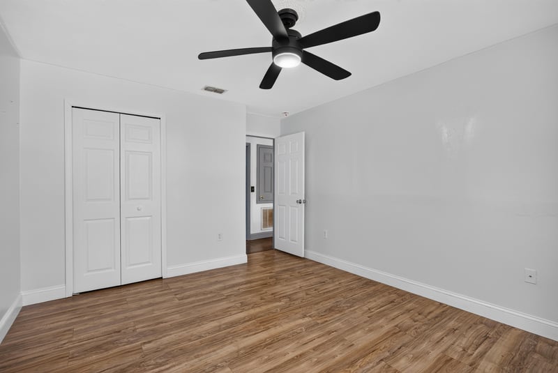 Bedroom with wood floor and closet door at 3428 Glenn Hollow Ct, Jacksonville, FL 32226