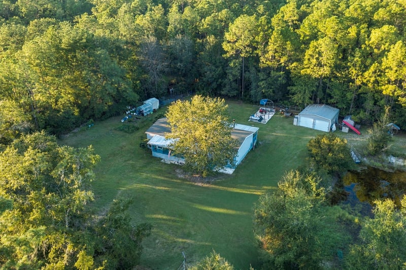 Aerial view of yard and outbuilding, photographed by Megapixeler on Secret Cove Rd, Middleburg, FL